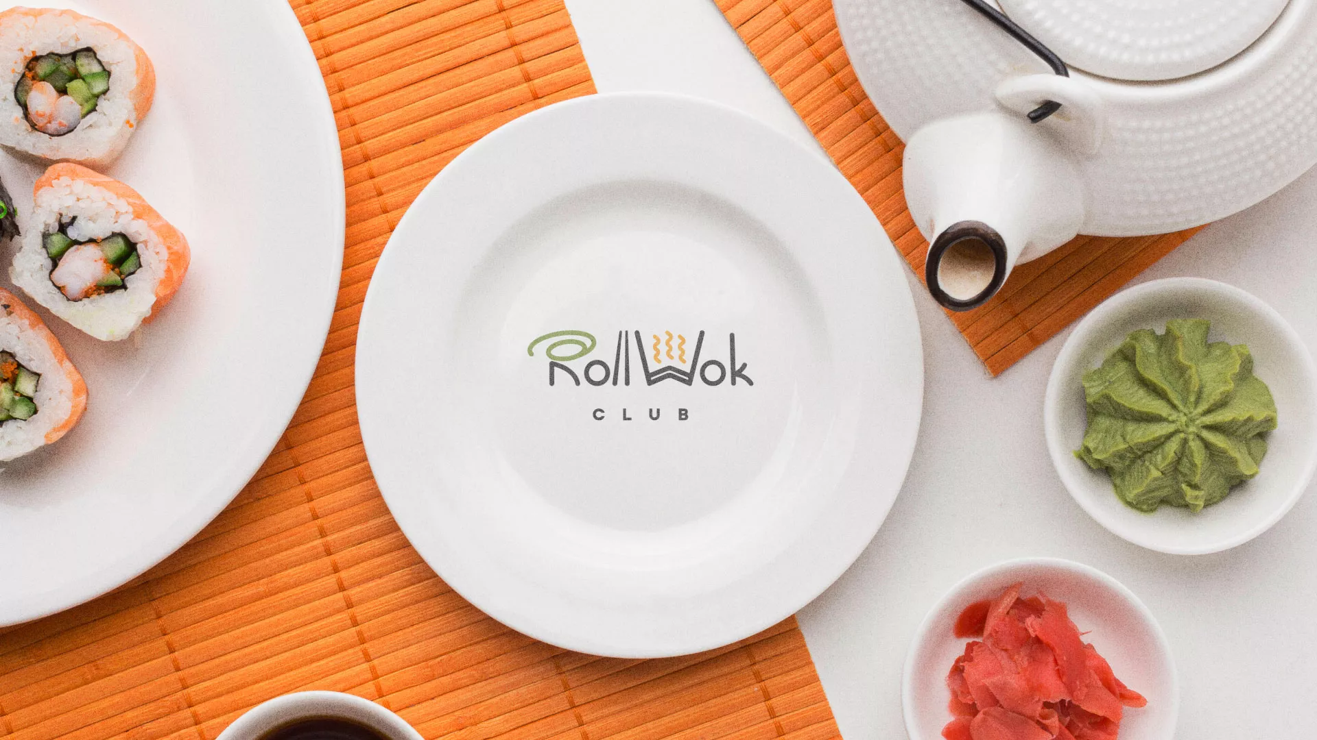 Разработка логотипа и фирменного стиля суши-бара «Roll Wok Club» в Тетюшах